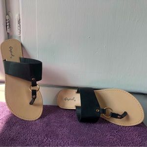 Qupid black leather sandals with gold ring accent, size 7.5